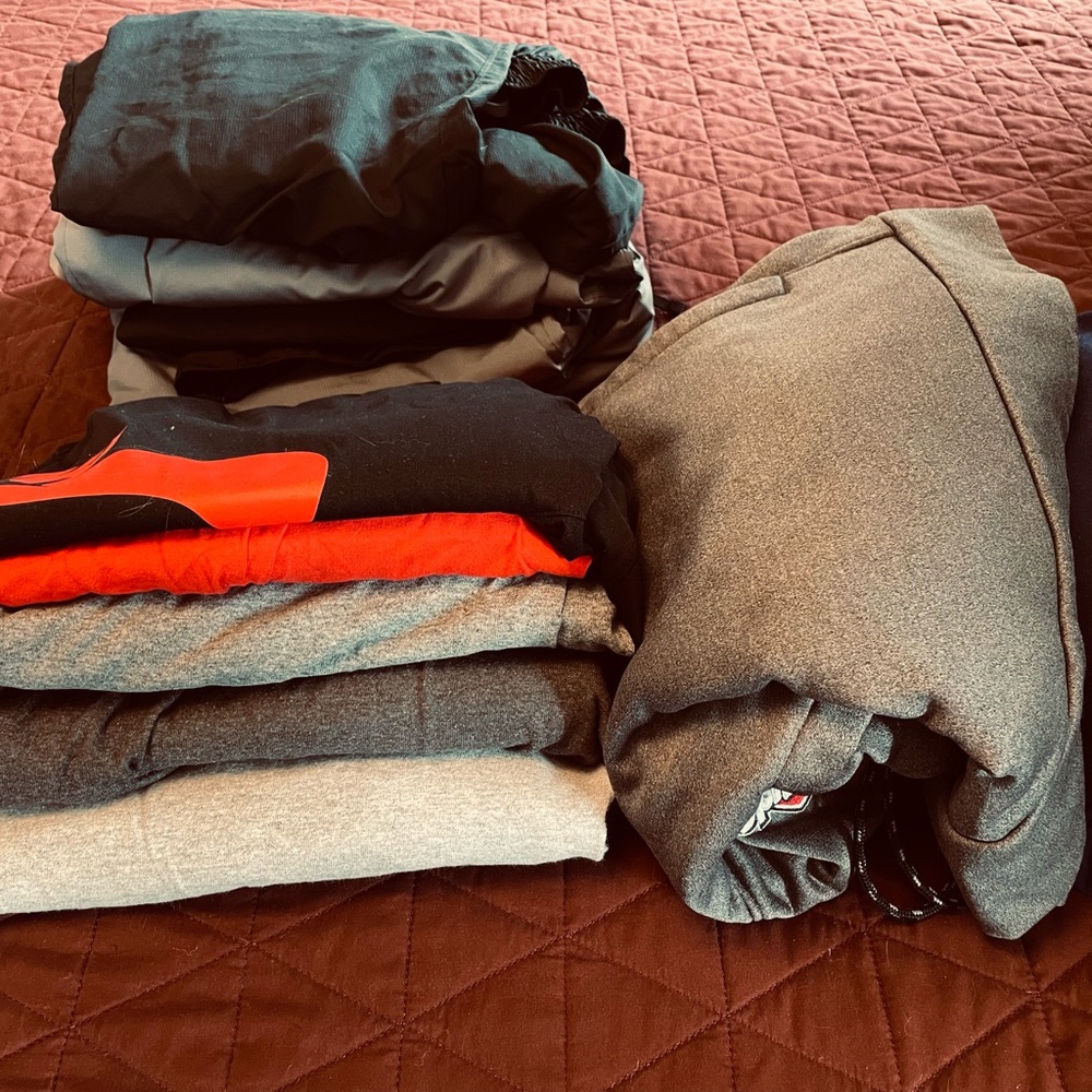 Men’s clothing bundle: under armour pants, Nike hoodie and some sports t shirts